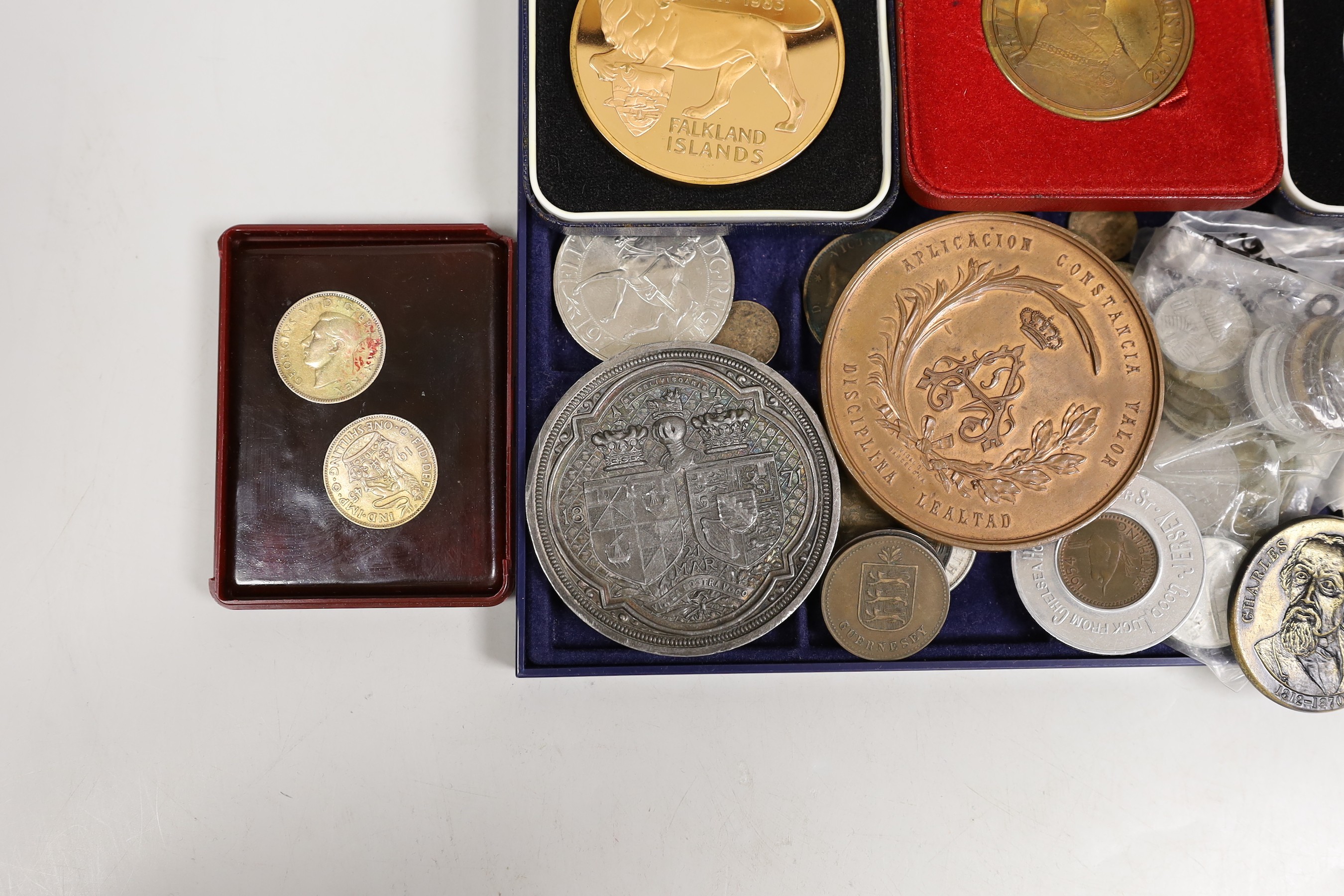 A Princess Louise marriage medal, a Barcelona 1878 valor bronze medal, two Falklands medals (one silver) and a Tower of London medal, and other various coins and medals